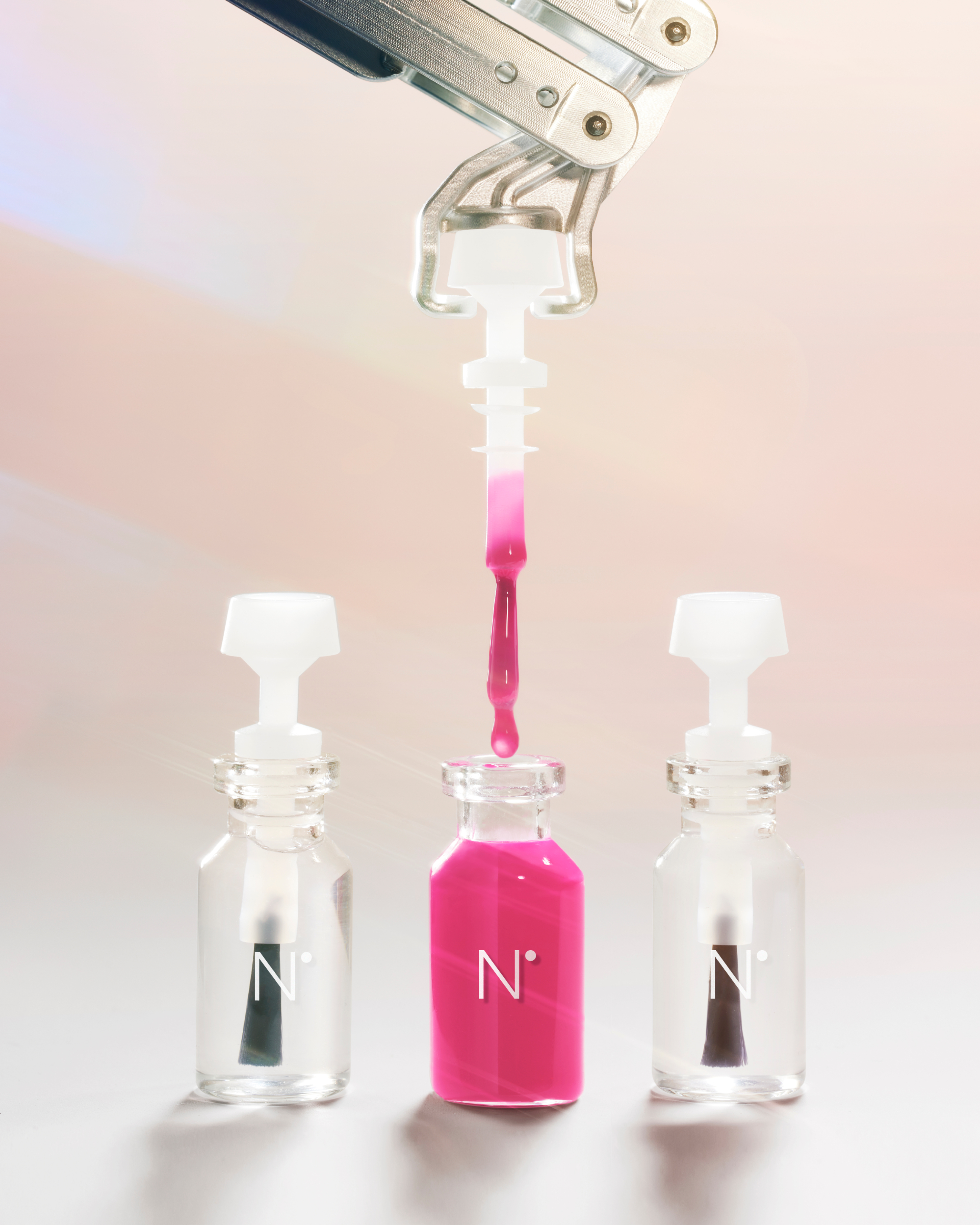 robotic arm opening nail polish