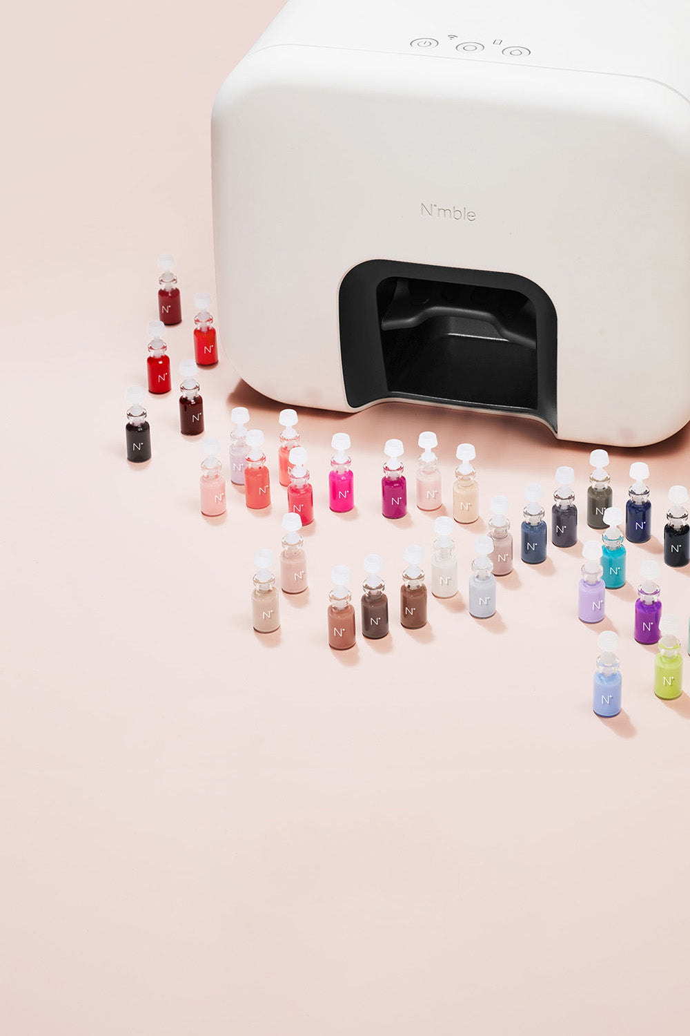 Nimble device and nail polish capsules